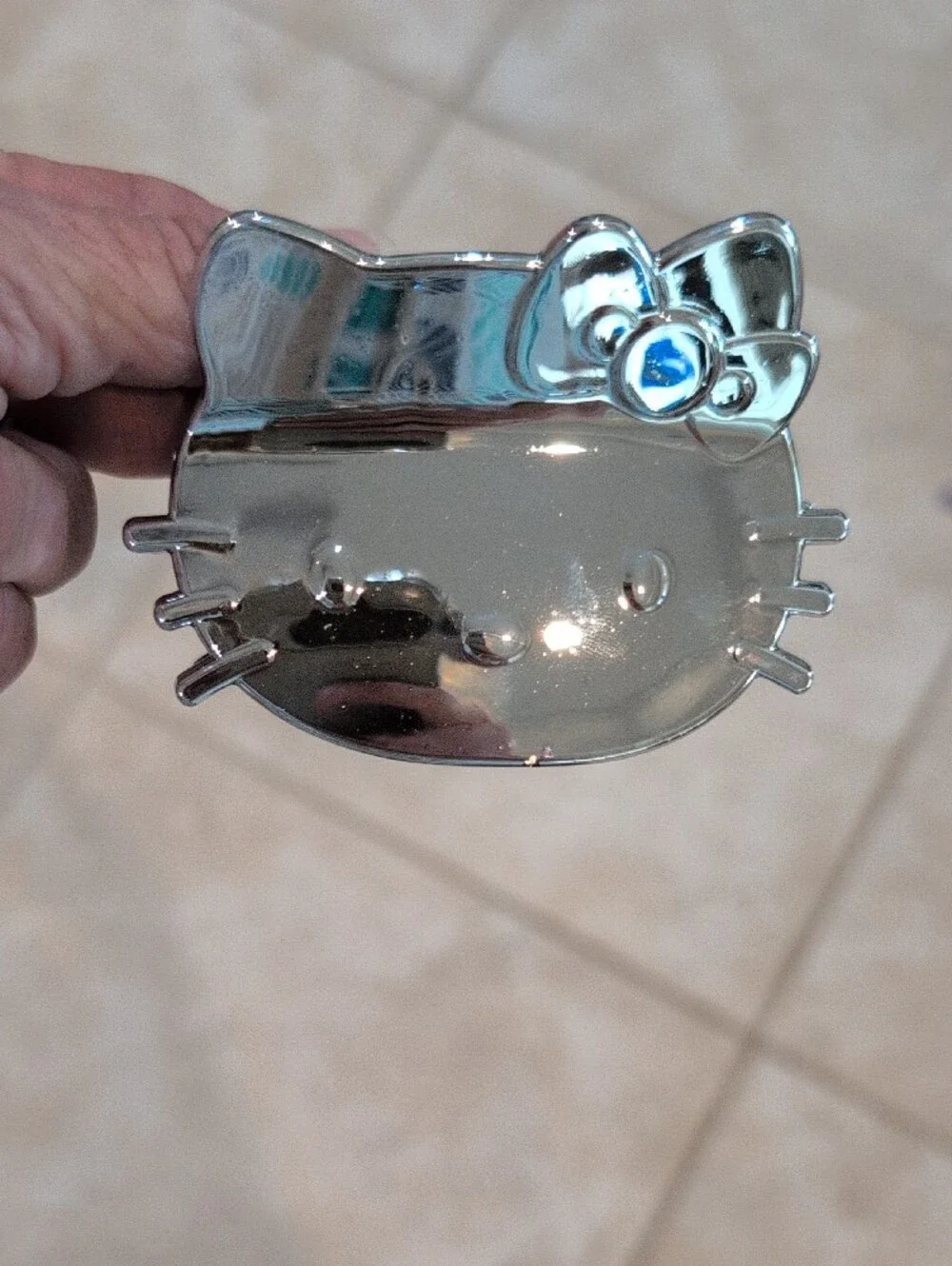 Hello Kitty Silver Toned Chromed Face And Bow Hair Clip